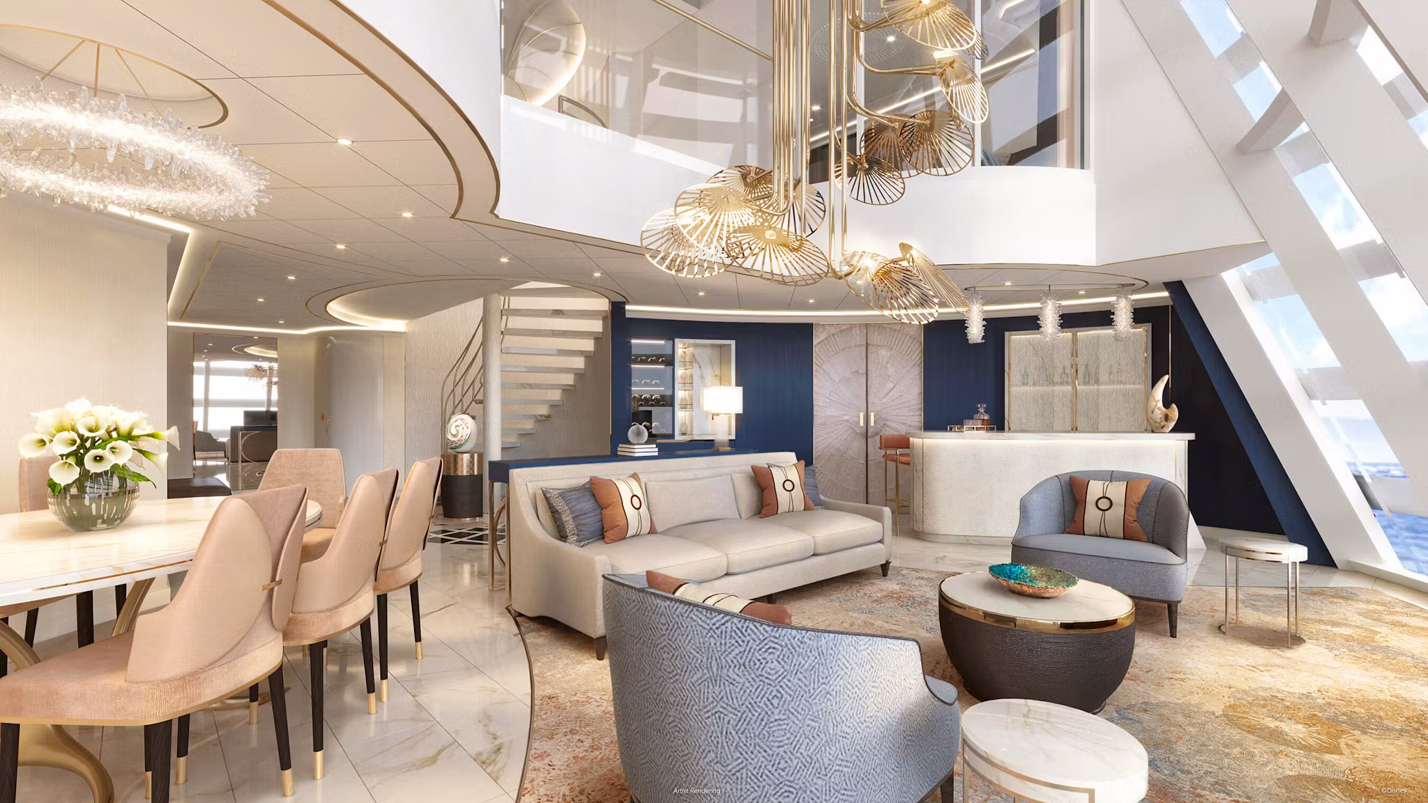 Luxury cruise cabin suite with seating area and ocean view