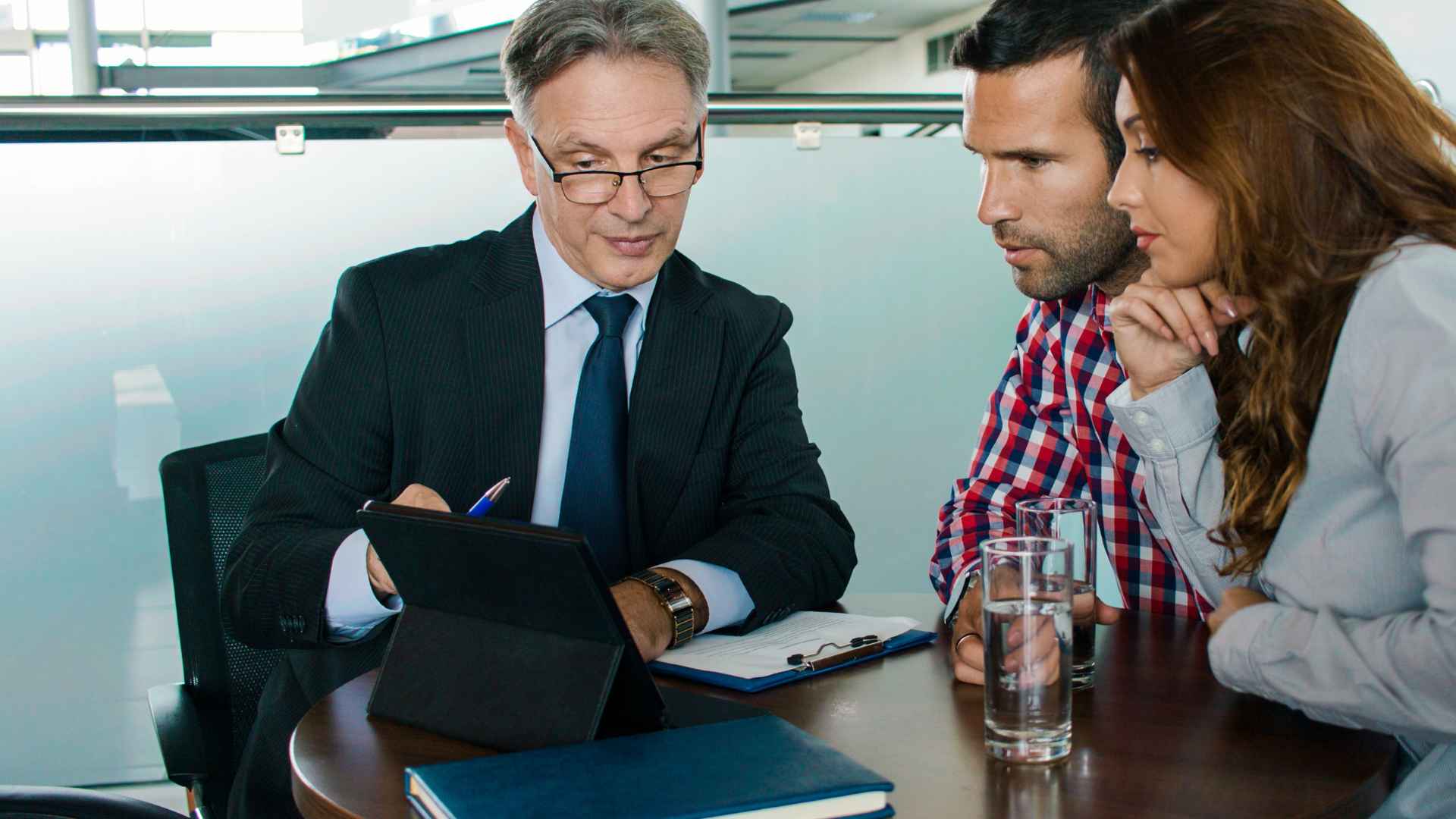 A luxury travel advisor with his clients.